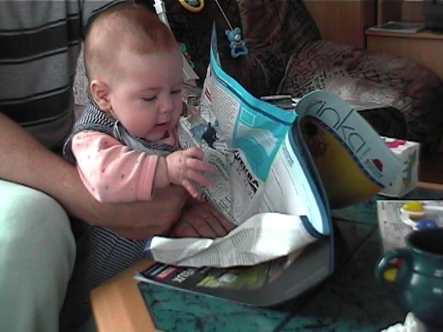 Miminko si te (Baby is reading)